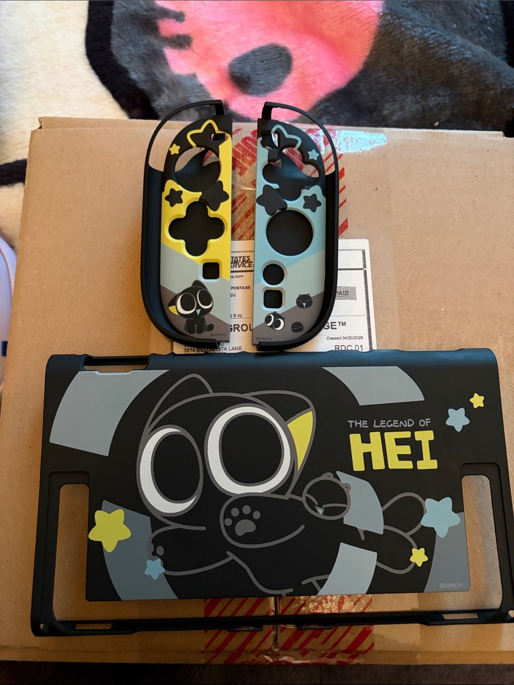 The Legend of Hei Black & Yellow Nintendo Switch 2 Joy-Con & hard Shell Set